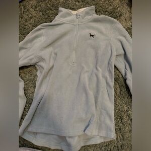 light blue-gray black dog quarter zip sweater